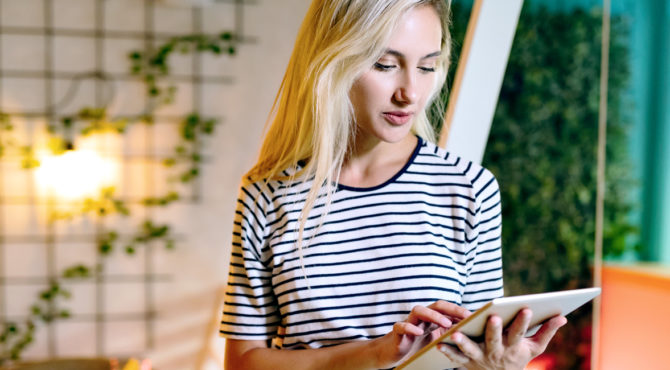 Photo of lady working on ipad