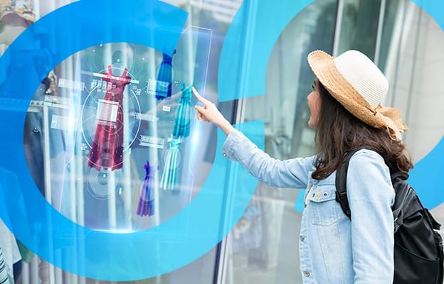 Woman leveraging digital display technology for real-time consumer engagement and planning insights.