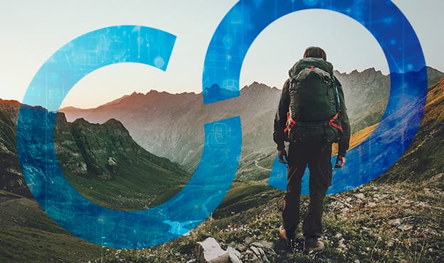 Backpacker hiking in mountain range