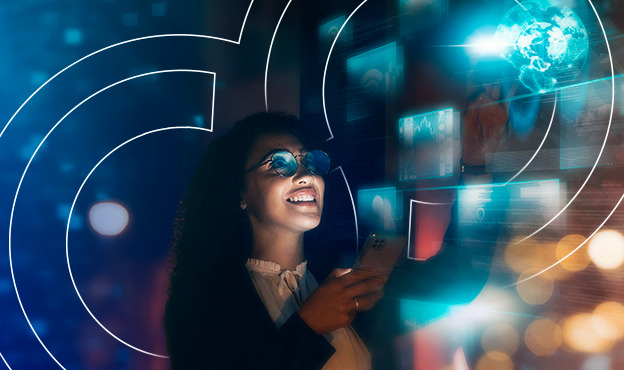 Woman interacting with a futuristic digital interface displaying holographic screens and a glowing globe, holding a smartphone, and smiling